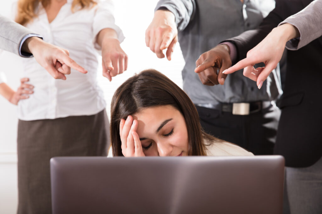 Hands Pointing Towards Businesswoman iStock 906762568